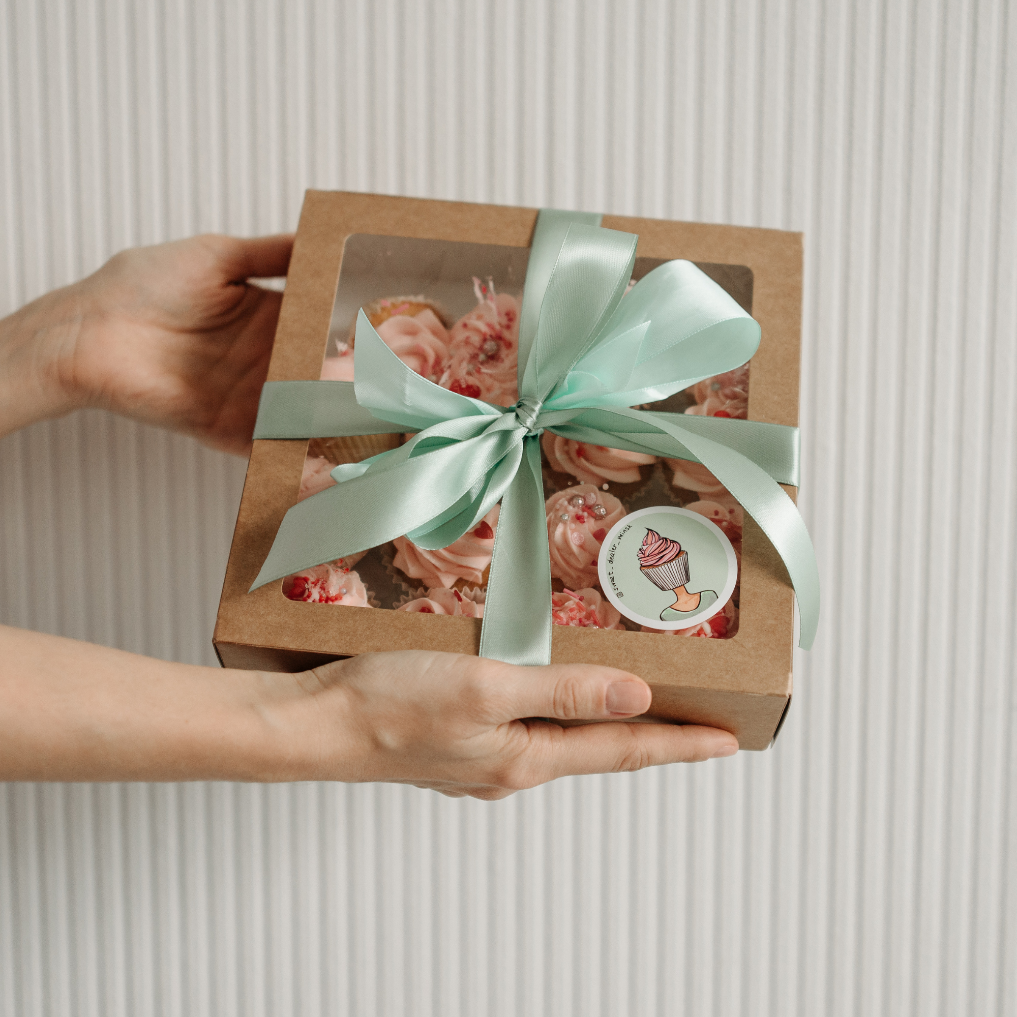 Baker handing off a beautiful order